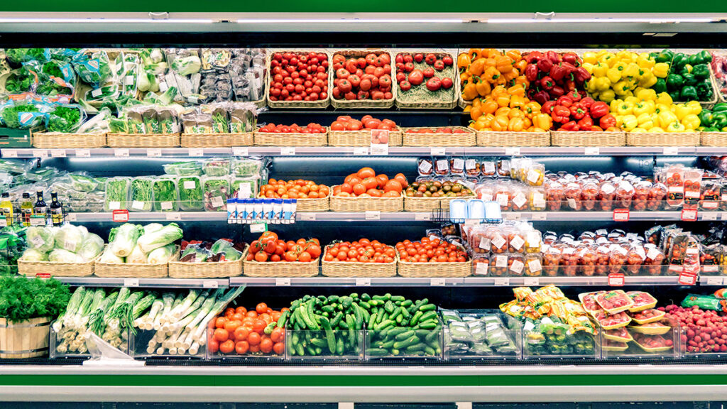 Fresh Vegetables On the Refrigerator Shelf In a Supermarket